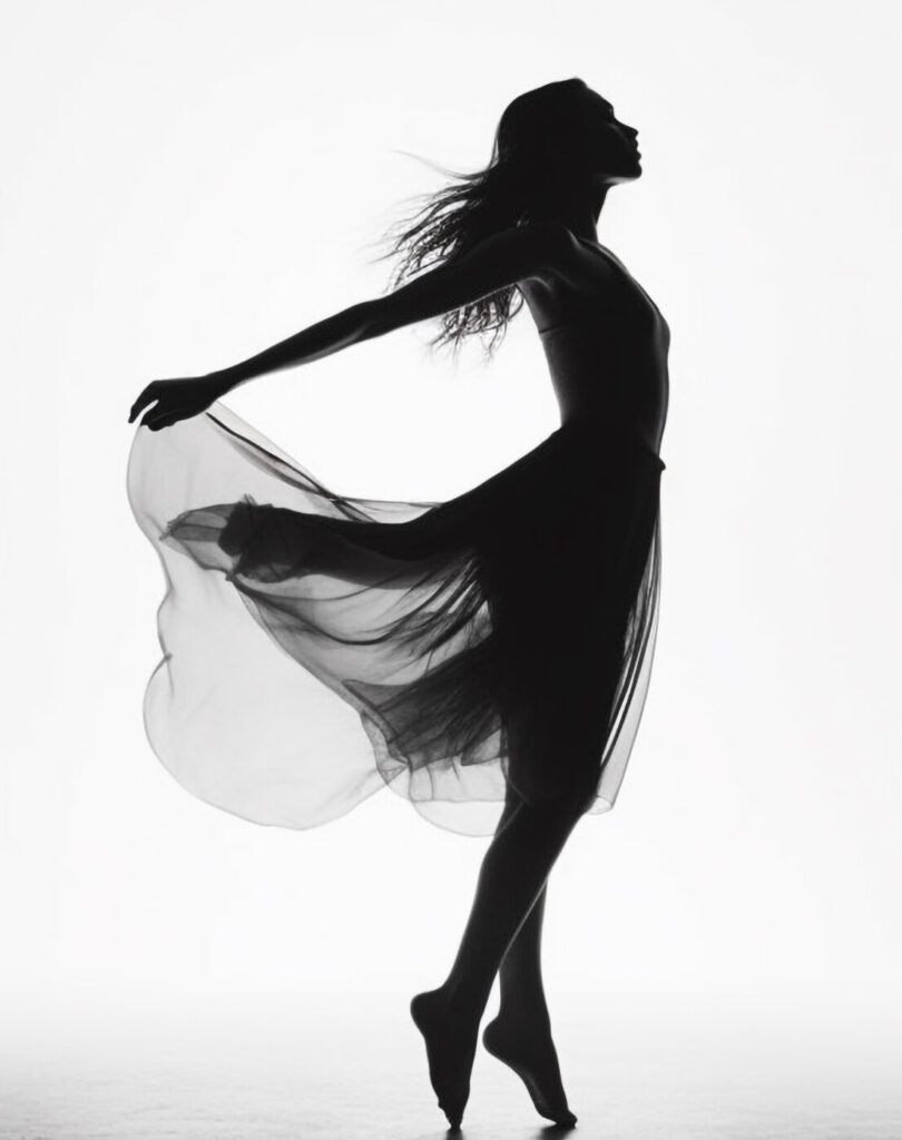 Graceful ballet dancer performs on stage, elegance generated by AI